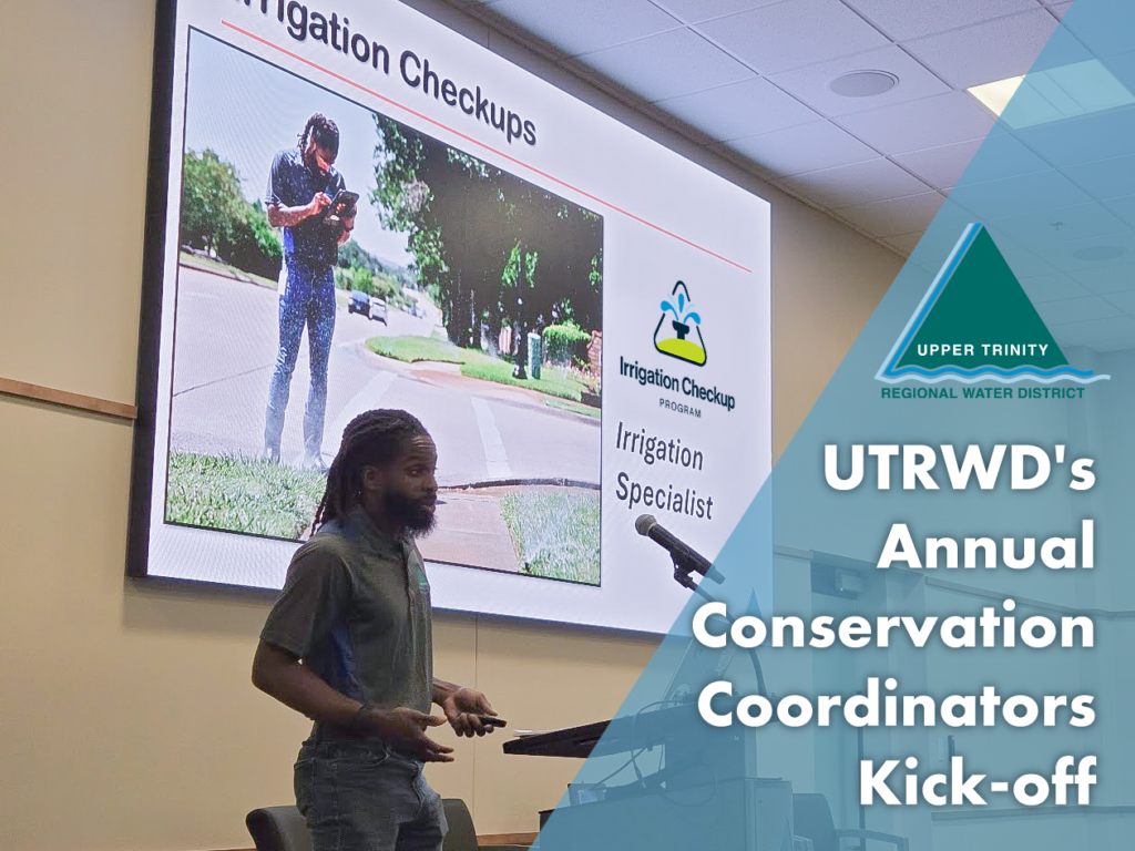 Speaker presenting a talk on irrigation checkups in a conference room; slide reads 'Irrigation Checkups' with 'Irrigation Specialist' and a water program logo nearby.
