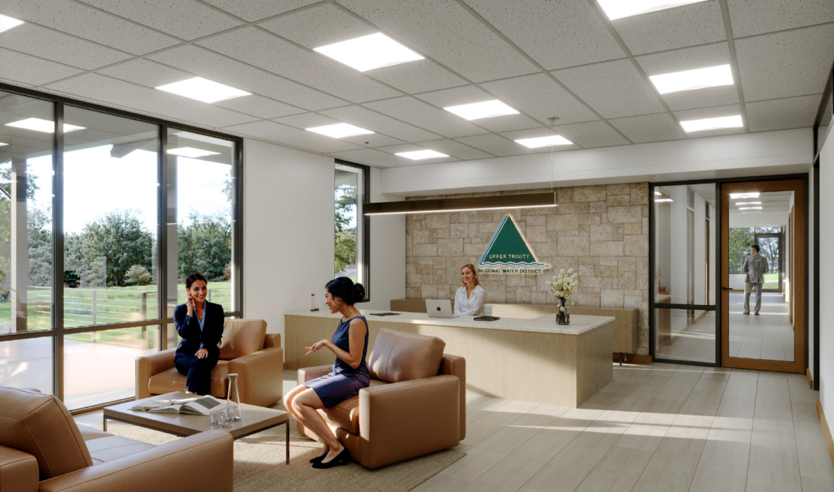 Rendering of inside the future Lake Ralph Hall Visitor Center, showing the reception desk and seating area.