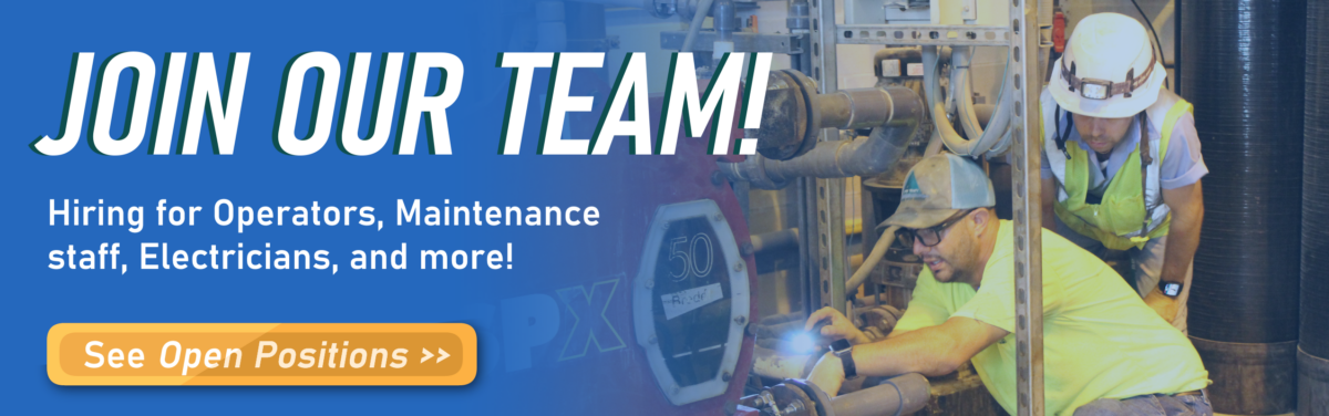 Recruitment banner with two workers in safety gear inspecting industrial equipment; bold 'JOIN OUR TEAM!' headline and orange 'See Open Positions' button.